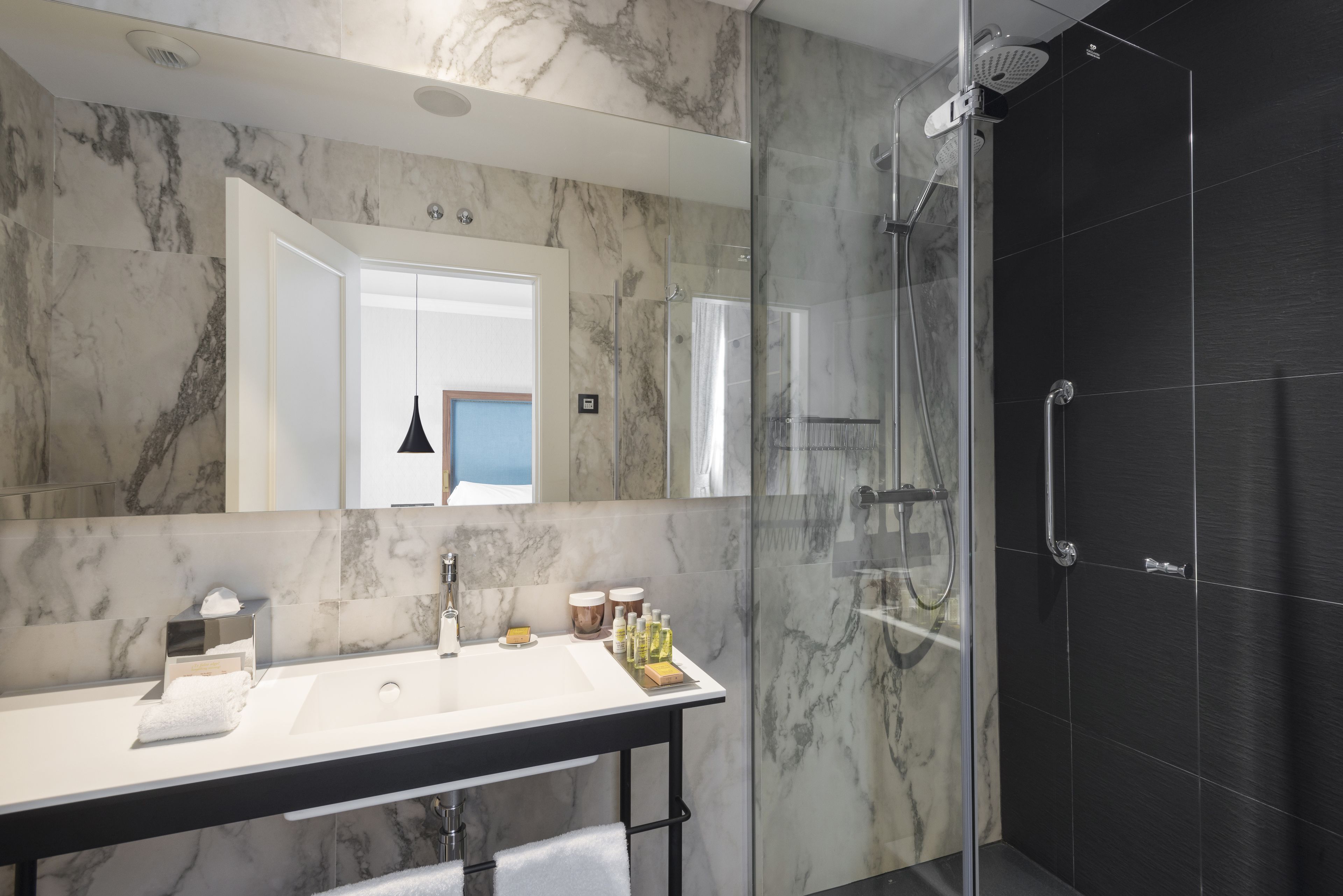 room, 1 king bed | bathroom | free toiletries, hair dryer, slippers, towels