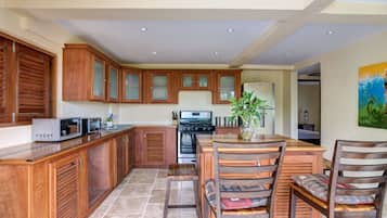 Luxury Villa, Ocean View | Private kitchen | Fridge, microwave, oven, stovetop