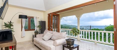 Luxury Villa, Ocean View | Living room | Flat-screen TV