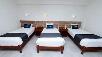 Chambre Triple | Literie hypoallergénique, couette en duvet d'oie, minibar