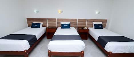 Triple Room | Hypo-allergenic bedding, down comforters, minibar