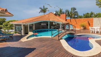 Outdoor pool, open 8:00 AM to 10:00 PM, pool loungers