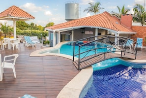 Outdoor pool, open 8:00 AM to 10:00 PM, sun loungers