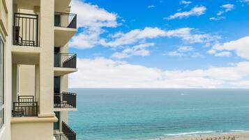 Enjoy stunning ocean views from the comfort of your balcony.
