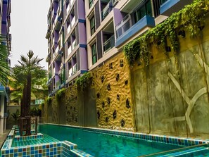 Outdoor pool, pool umbrellas, sun loungers