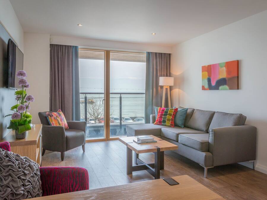 Classic Suite, 2 Bedrooms, Balcony, Partial Sea View | Living area | TV