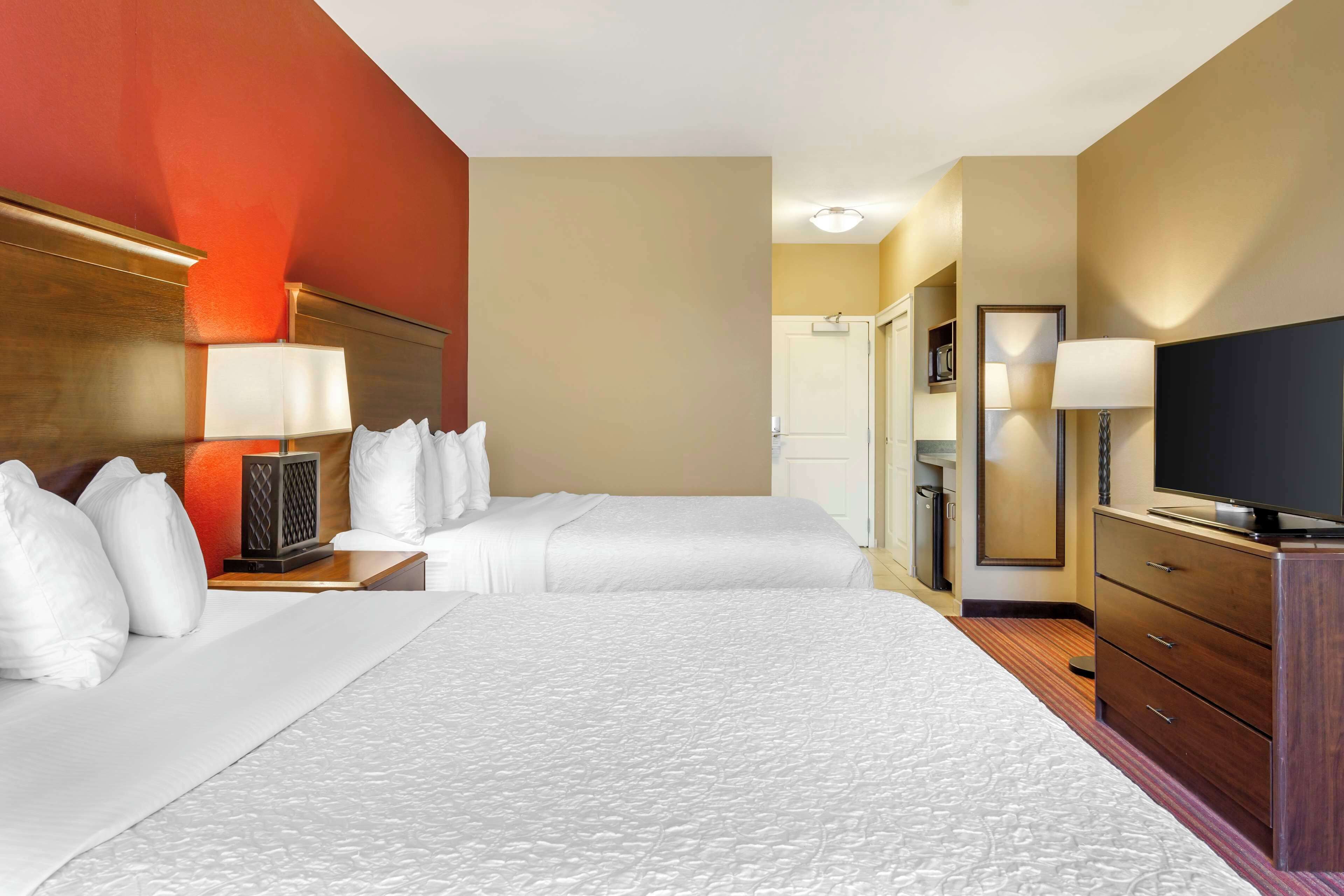 suite, 2 queen beds, accessible, kitchen | tempur-pedic beds, desk, laptop workspace, blackout curtains