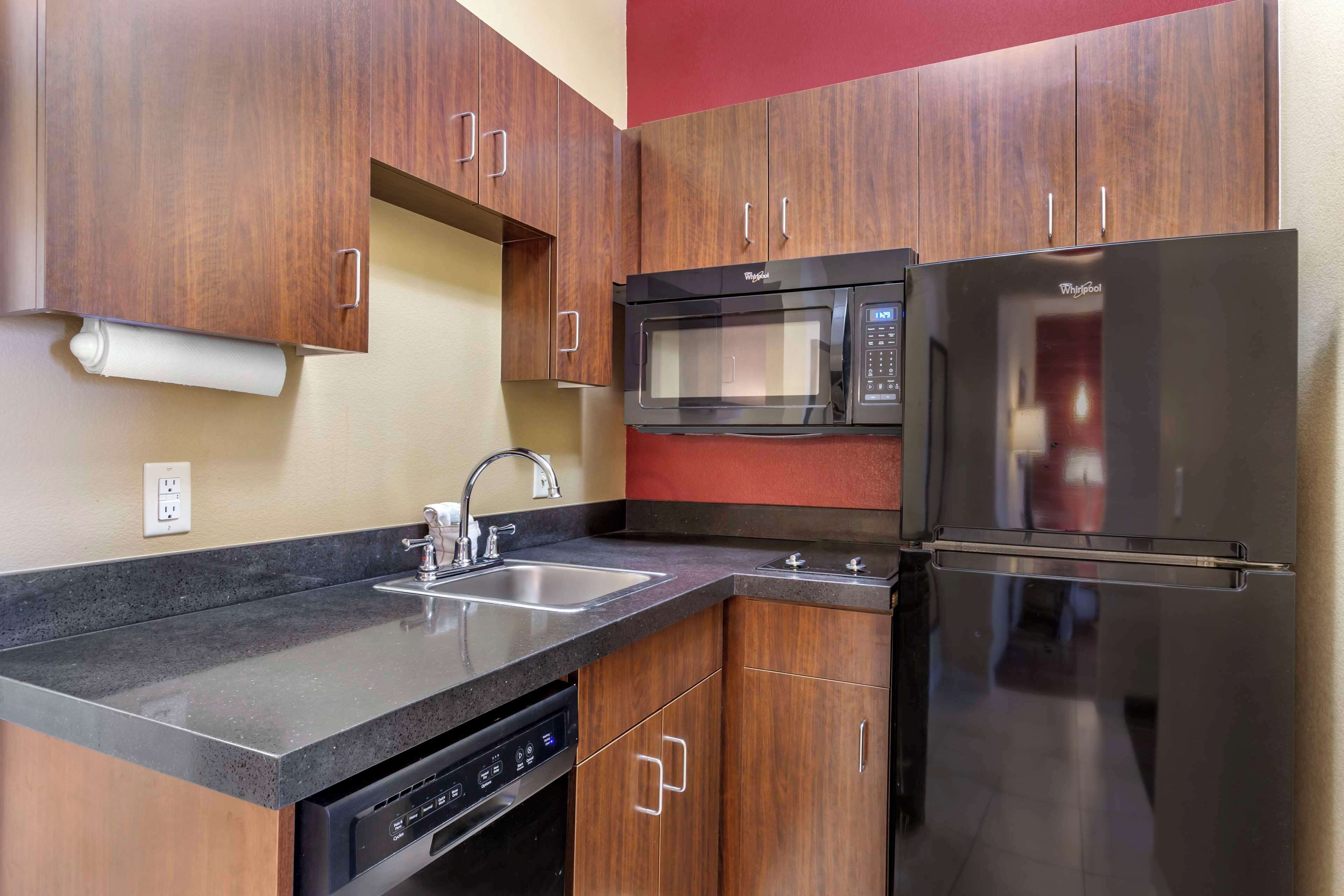 tempur-pedic beds, desk, laptop workspace, blackout curtains