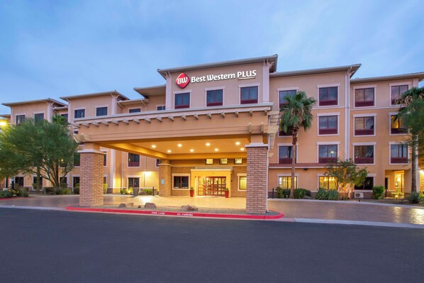 A hotel entrance with a covered walkway, multiple floors, and a sign reading "Best Western PLUS." - Best Western Plus Chandler Hotel & Suites (Chandler)