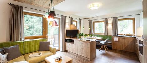 Exclusive Apartment (1) | Living area | Flat-screen TV, ping pong