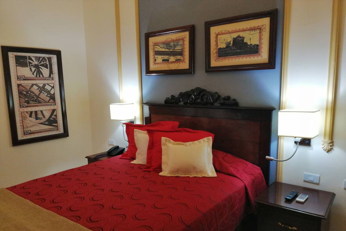 Minibar, desk, blackout drapes, bed sheets