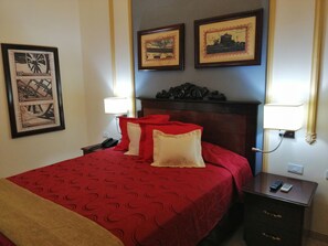 Minibar, desk, blackout drapes, bed sheets