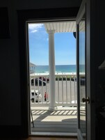 Deluxe Room, 1 Queen Bed, Shared Bathroom, Ocean View | Balcony