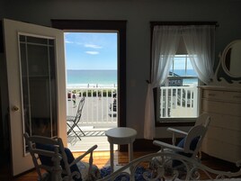 Deluxe Room, 1 Queen Bed, Shared Bathroom, Ocean View | Living area | Flat-screen TV
