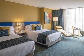 Premium bedding, down comforters, minibar, in-room safe