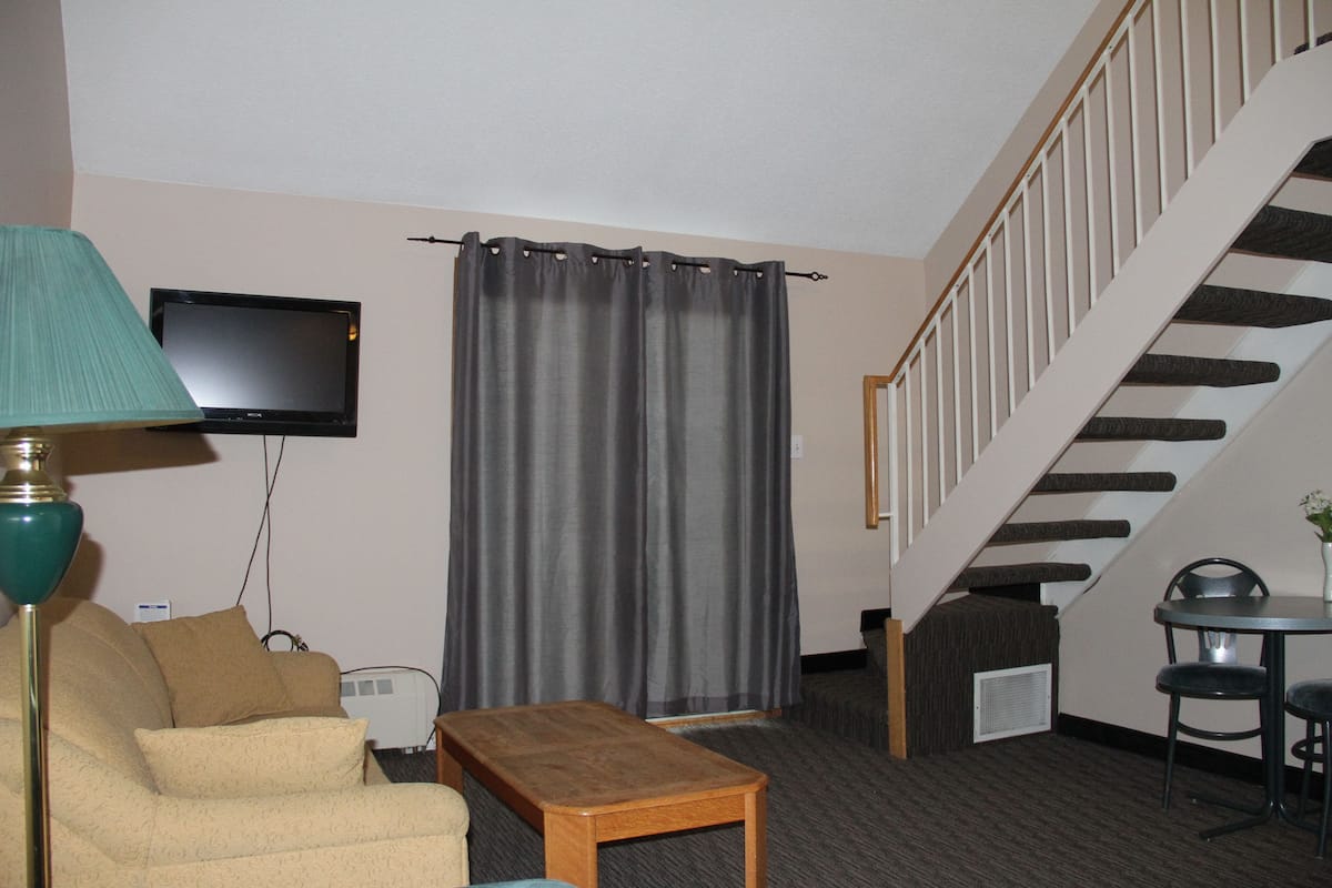 1 bedroom, desk, iron/ironing board, bed sheets