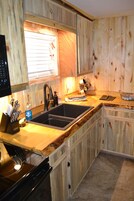 Family Cabin, 2 Bedrooms, River View, Overwater | Private kitchen | Fridge, microwave, oven, stovetop