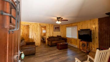 Family Cabin, 2 Bedrooms, River View, Overwater | Living area | Flat-screen TV