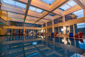 Indoor pool, sun loungers - The Biltmore Hotel Tbilisi (Tbilisi)