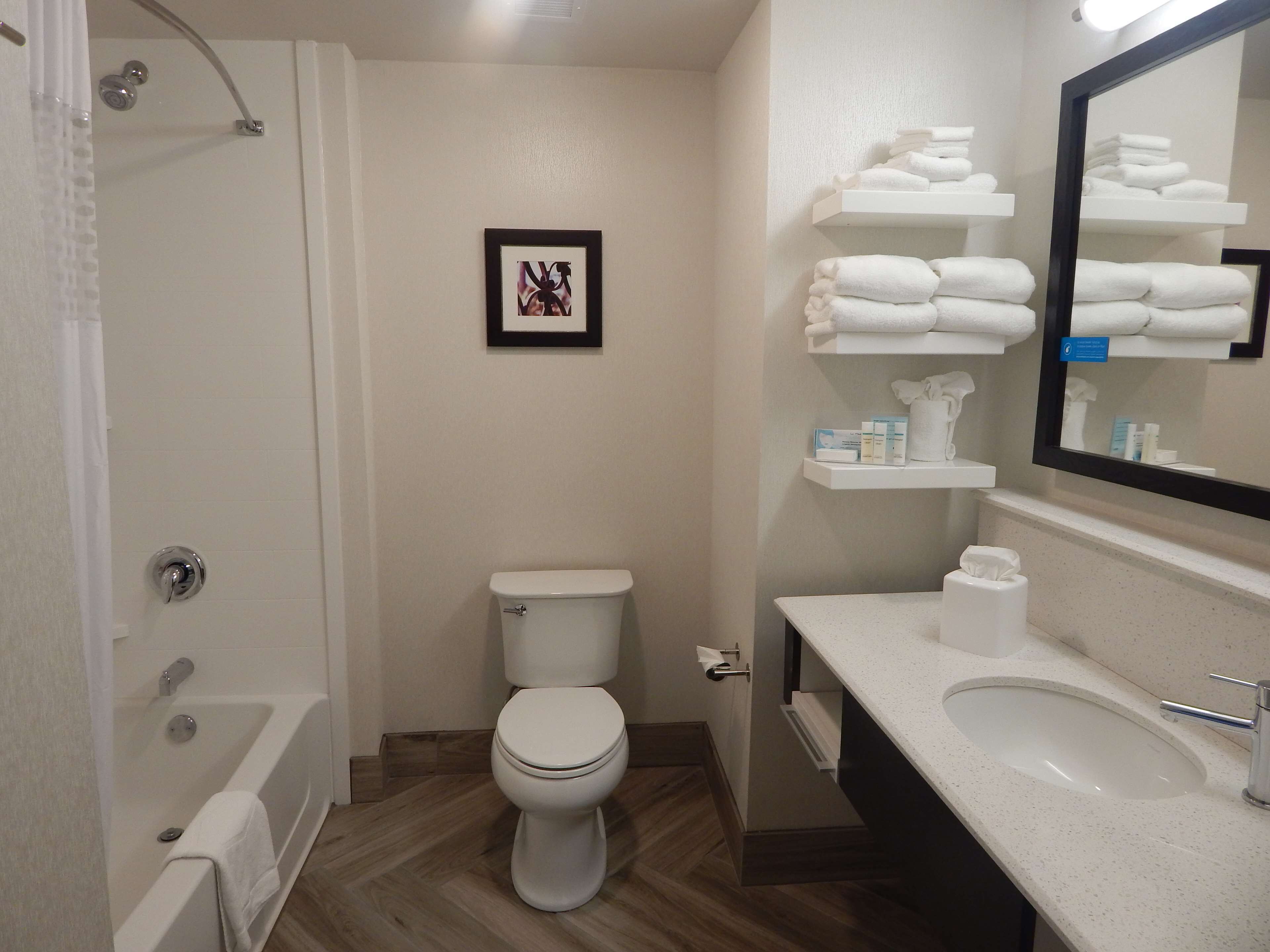 room, 2 queen beds | bathroom | free toiletries, hair dryer, towels