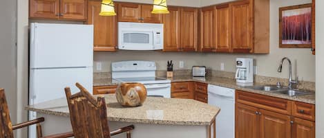 Fridge, microwave, dishwasher, cookware/dishes/utensils