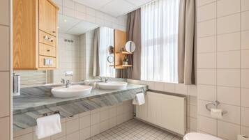 Hair dryer, towels, soap, shampoo