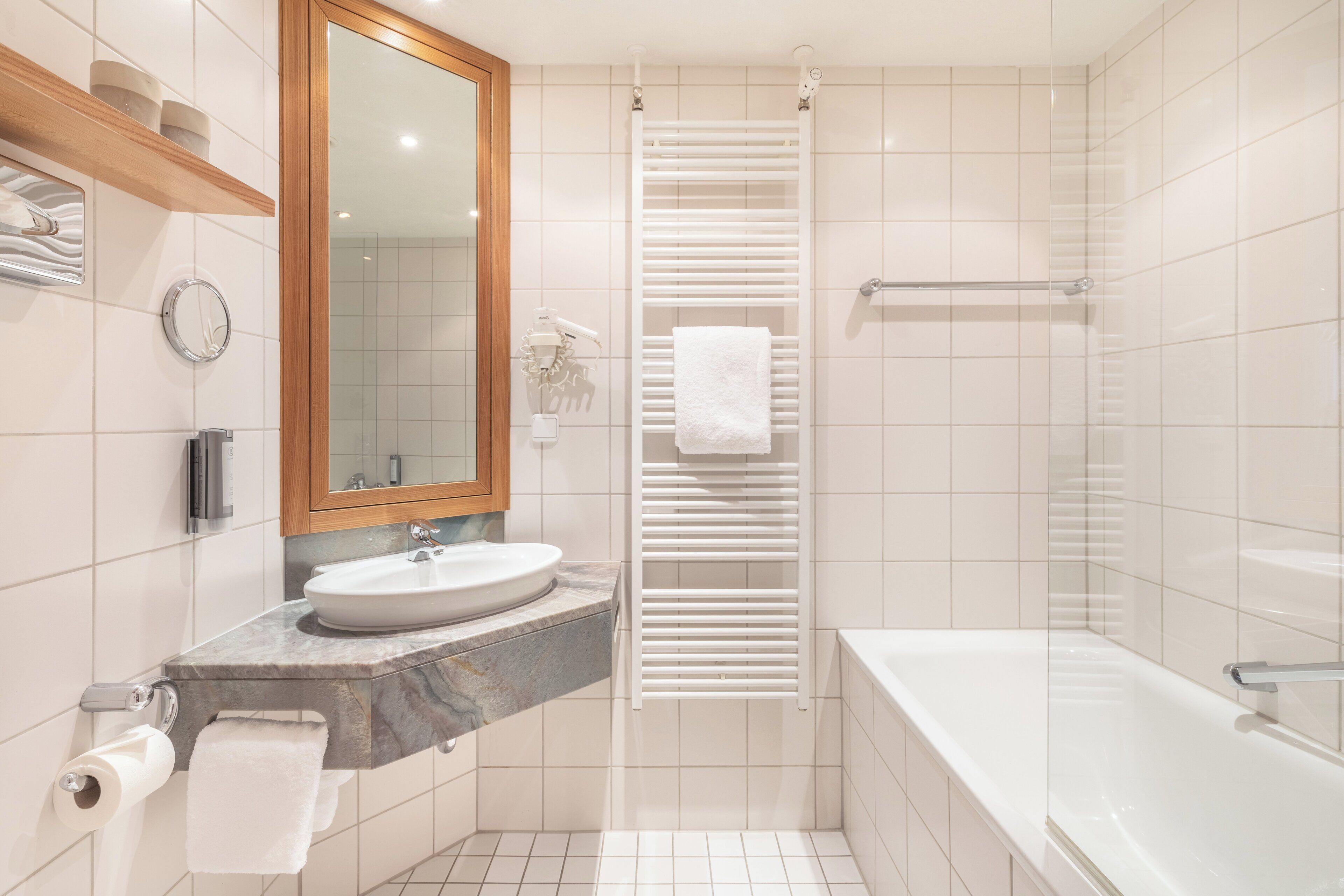 hair dryer, towels, soap, shampoo