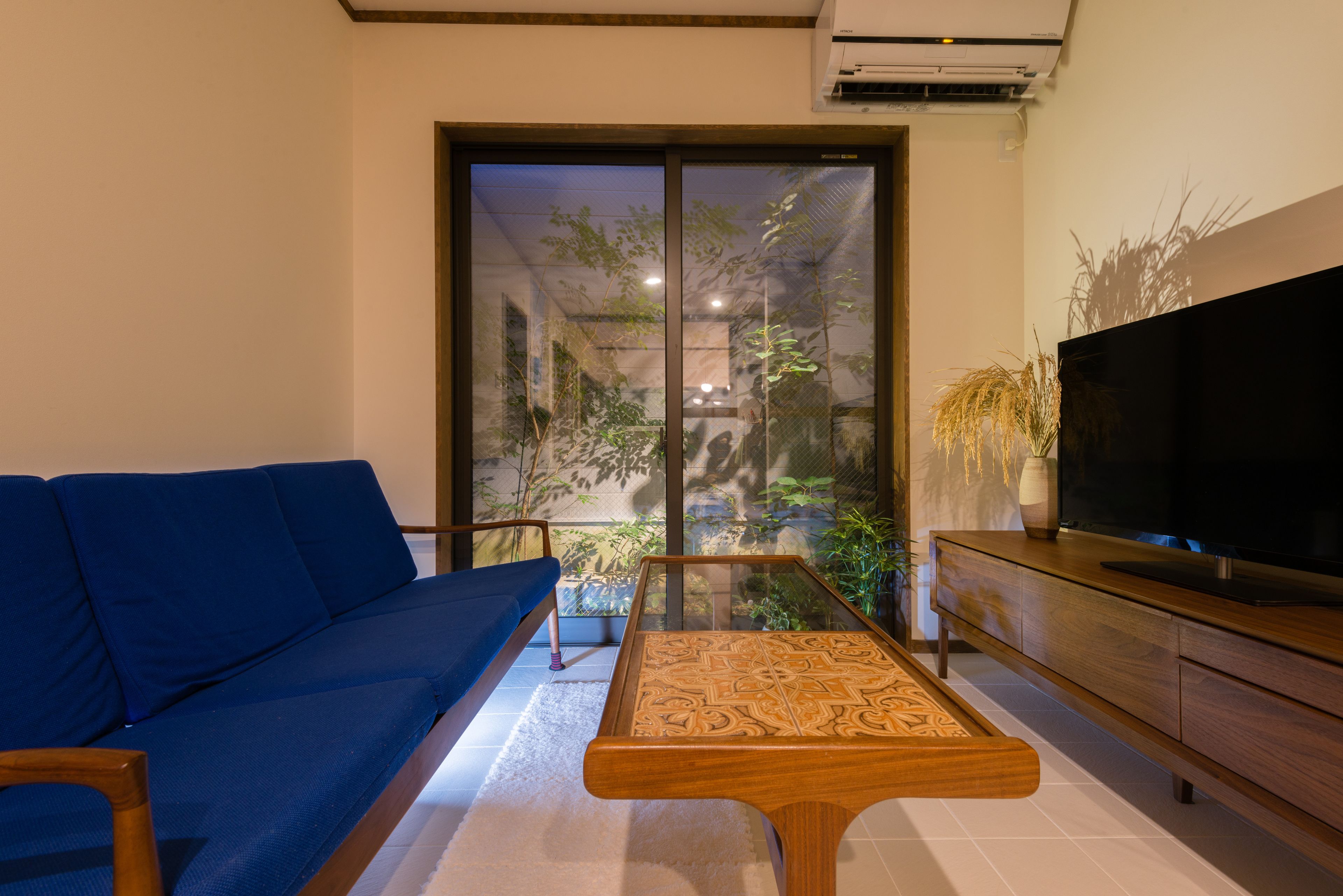 Furnished townhouse (for 1 group) with island kitchen and free bicycles | Living area | 39-inch flat-screen TV with digital channels, TV, DVD player