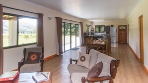 Luxury Cottage, 3 Bedrooms, Mountain View | Living area - Kamberg Valley Hideaway (Elandskop)