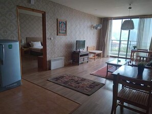 Standard Suite | Living area | Flat-screen TV - Bhutan Suites (Thimphu)