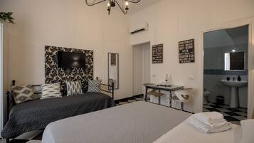 Luxe kamer | Luxe beddengoed, individueel gemeubileerd, verduisterende gordijnen