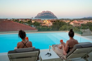 Outdoor pool, a rooftop pool, sun loungers