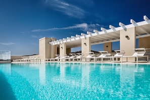 Outdoor pool, a rooftop pool, sun loungers