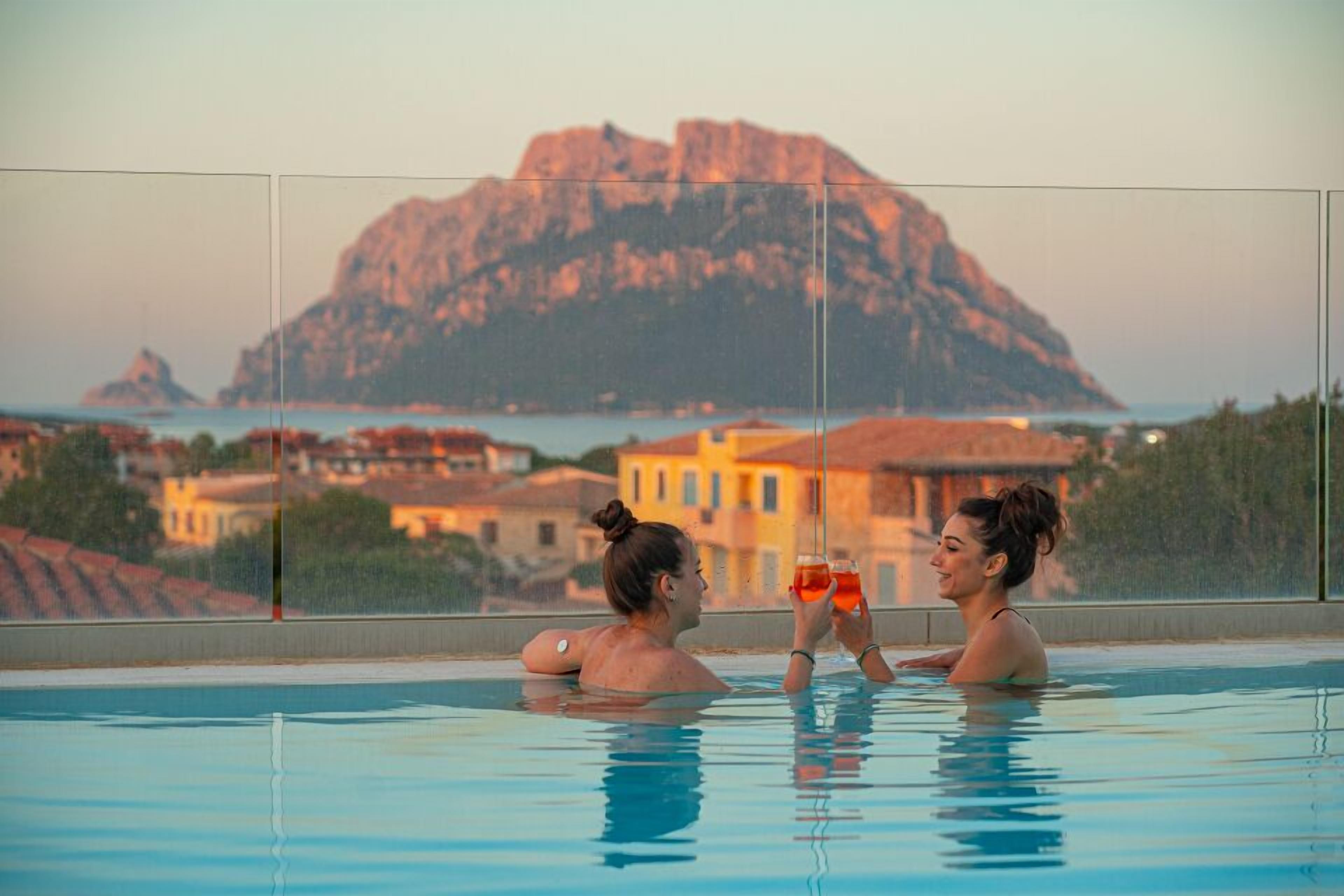 Outdoor pool, a rooftop pool, sun loungers