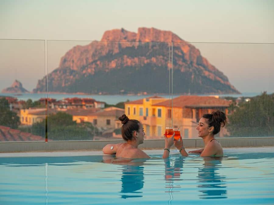 Outdoor pool, a rooftop pool, pool loungers