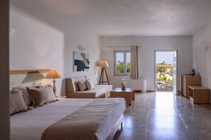 Superior Suite | Living area | 32-inch flat-screen TV with satellite channels, TV - Aliter Suites (Santorini)