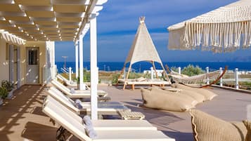 Outdoor pool, pool umbrellas, pool loungers