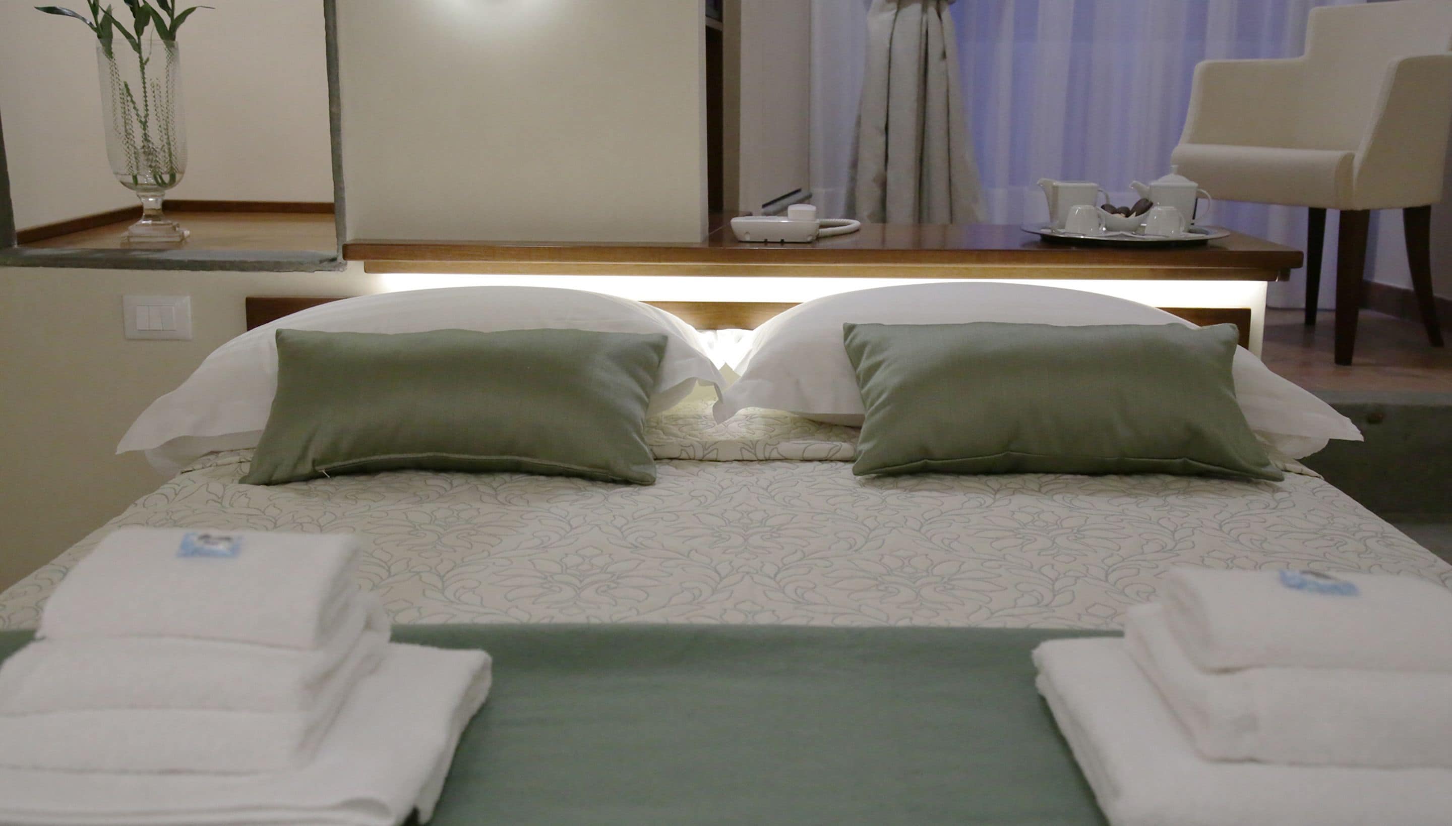 family room | 1 bedroom, premium bedding, minibar, in-room safe