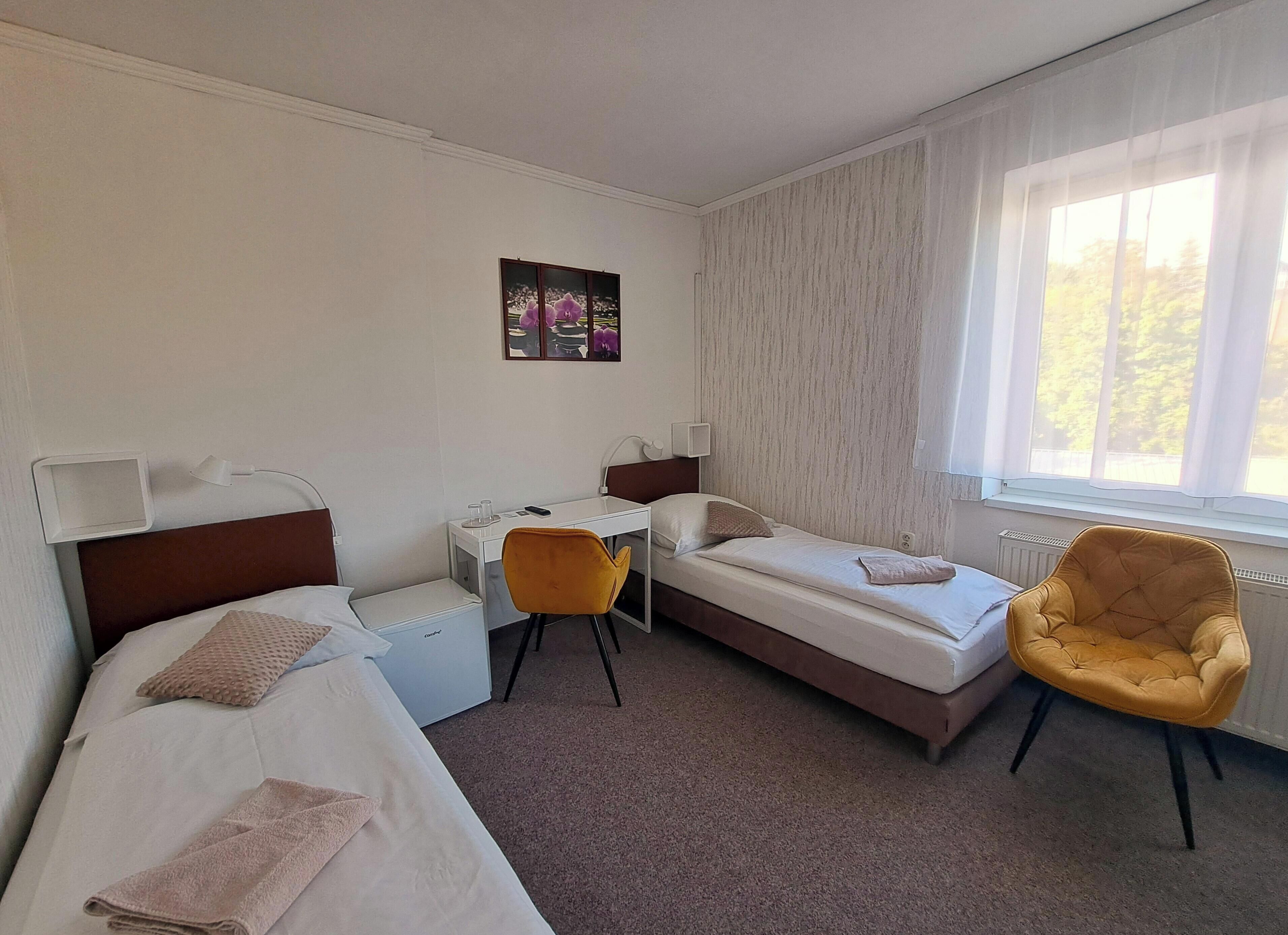 Economy Twin Room, 1 Bedroom | Select Comfort beds, blackout curtains, iron/ironing board, free WiFi