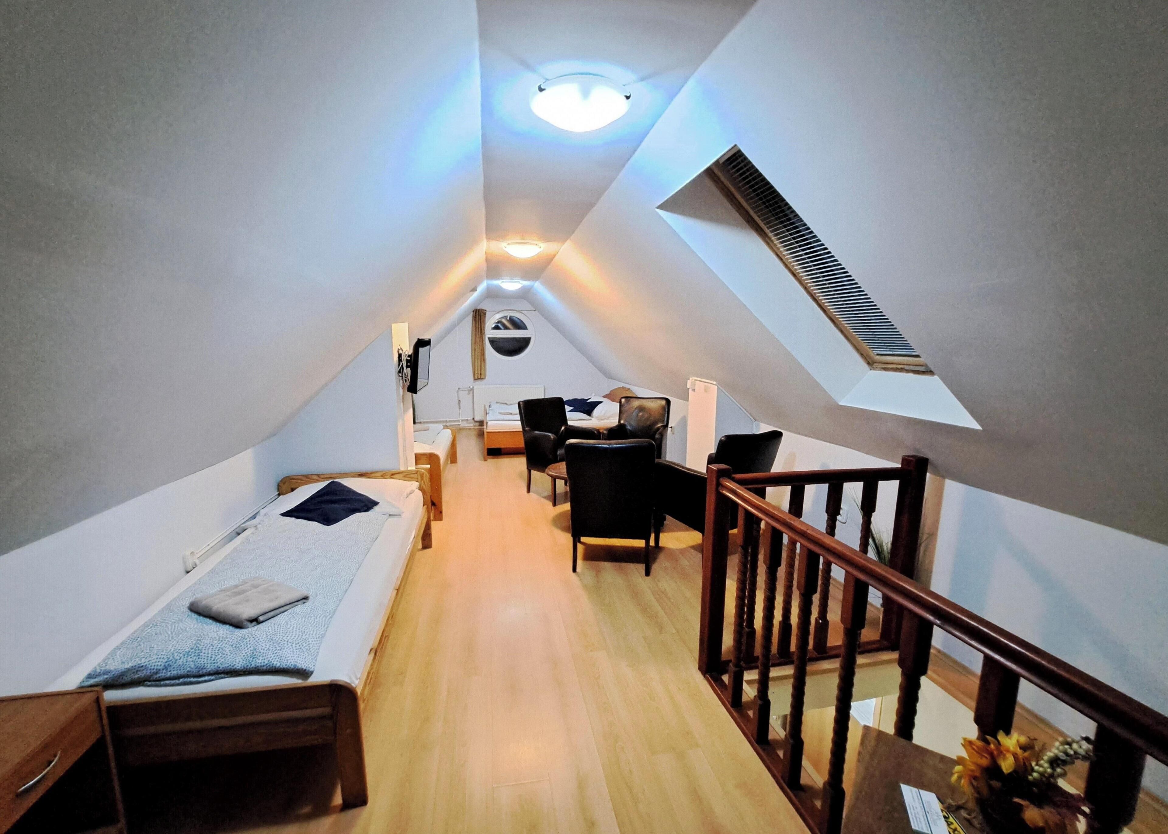 Quadruple Room | Select Comfort beds, blackout curtains, iron/ironing board, free WiFi
