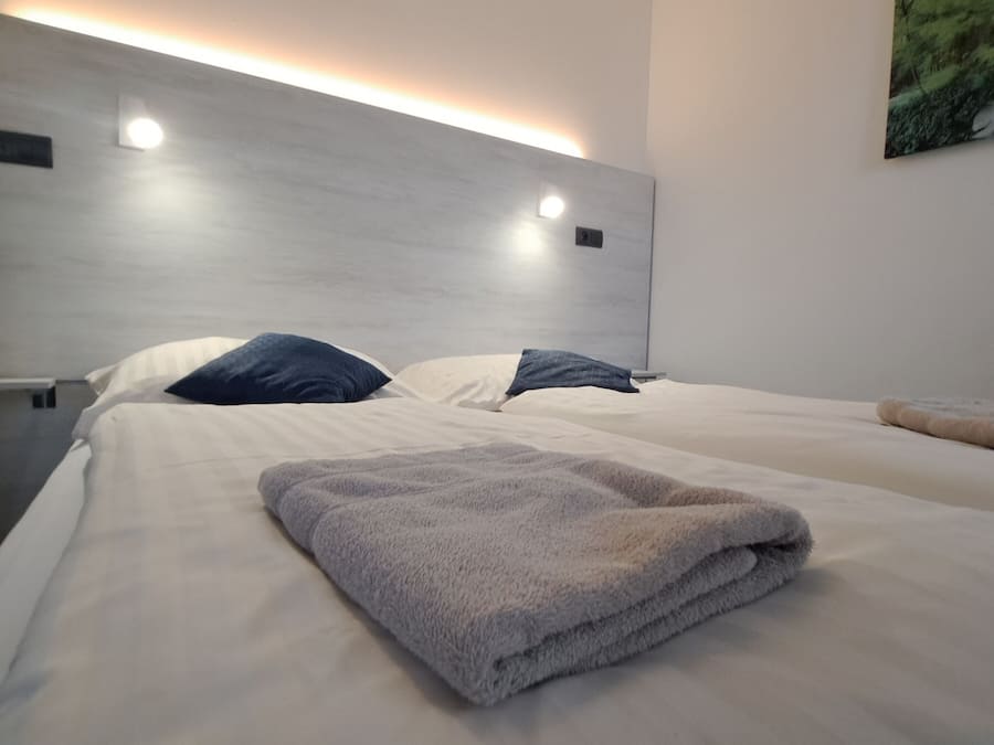 Triple Room | Select Comfort beds, blackout curtains, iron/ironing board, free WiFi