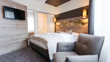 Double Room | Minibar, in-room safe, desk, blackout drapes