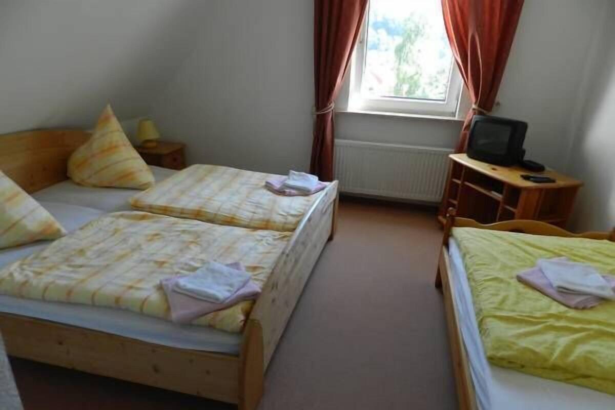 Triple Room | Living area | TV