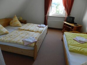 Triple Room | Living area | TV