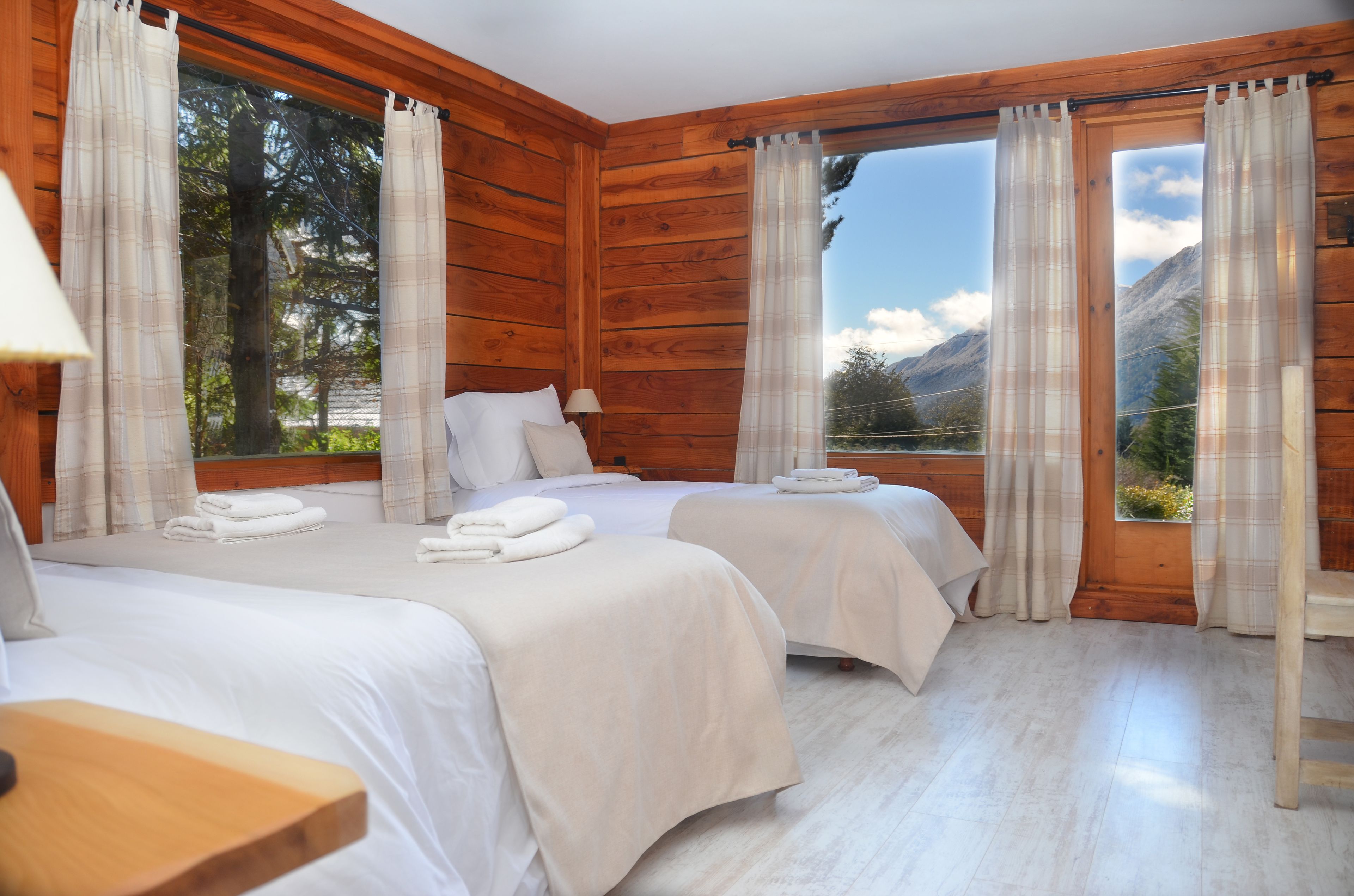 Superior Triple Room, Partial Lake View | Minibar, in-room safe, desk, iron/ironing board