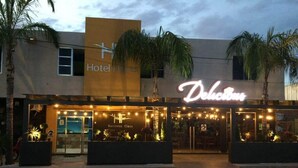 A hotel named 'Hotel Flores' with a 'Business Class' section and a 'Delicious' restaurant. - Hotel Flores (Guamuchil)