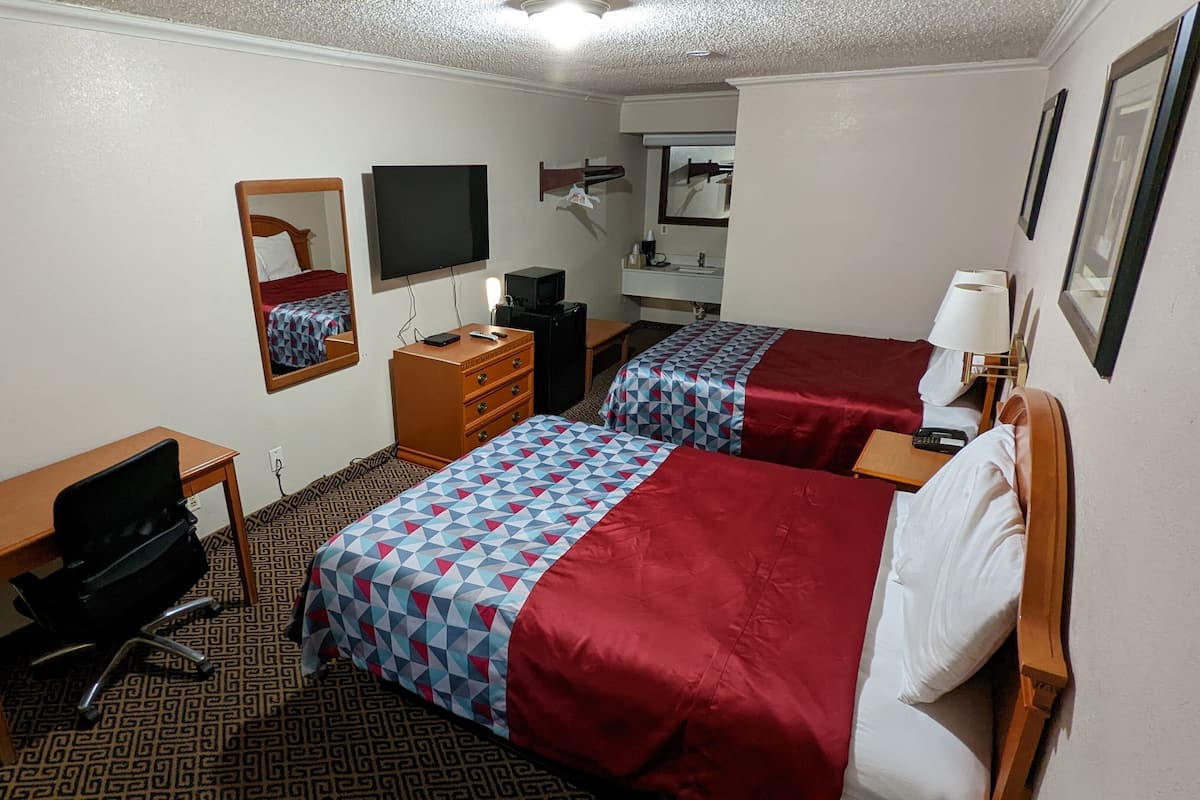 Economy Double Room, 2 Bedrooms | Desk, blackout curtains, iron/ironing board, free WiFi