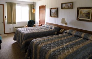 Habitación, 2 camas dobles | 1 dormitorio y wifi gratis