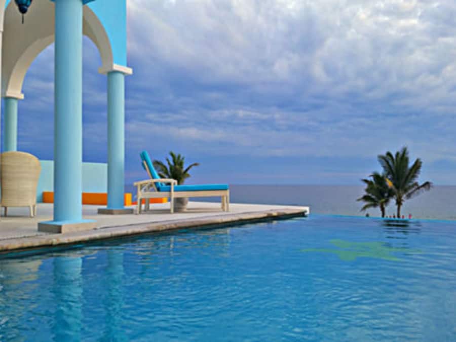 Outdoor pool, open 9:00 AM to 10:00 PM, pool umbrellas, sun loungers