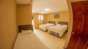Basic Triple Room | Blackout drapes, free WiFi, bed sheets